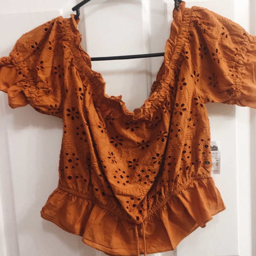 Adorable orange off the shoulder shirt
